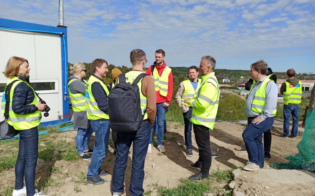 Photo shows the partners of the Liquid Energy project from Poland, Lithuania and Estonia during a visit to the Waste Treatment Utility Gdańsk. They are guided by their president, Grzegorz Orzeszko, who presents the degassing system of a landfill.
